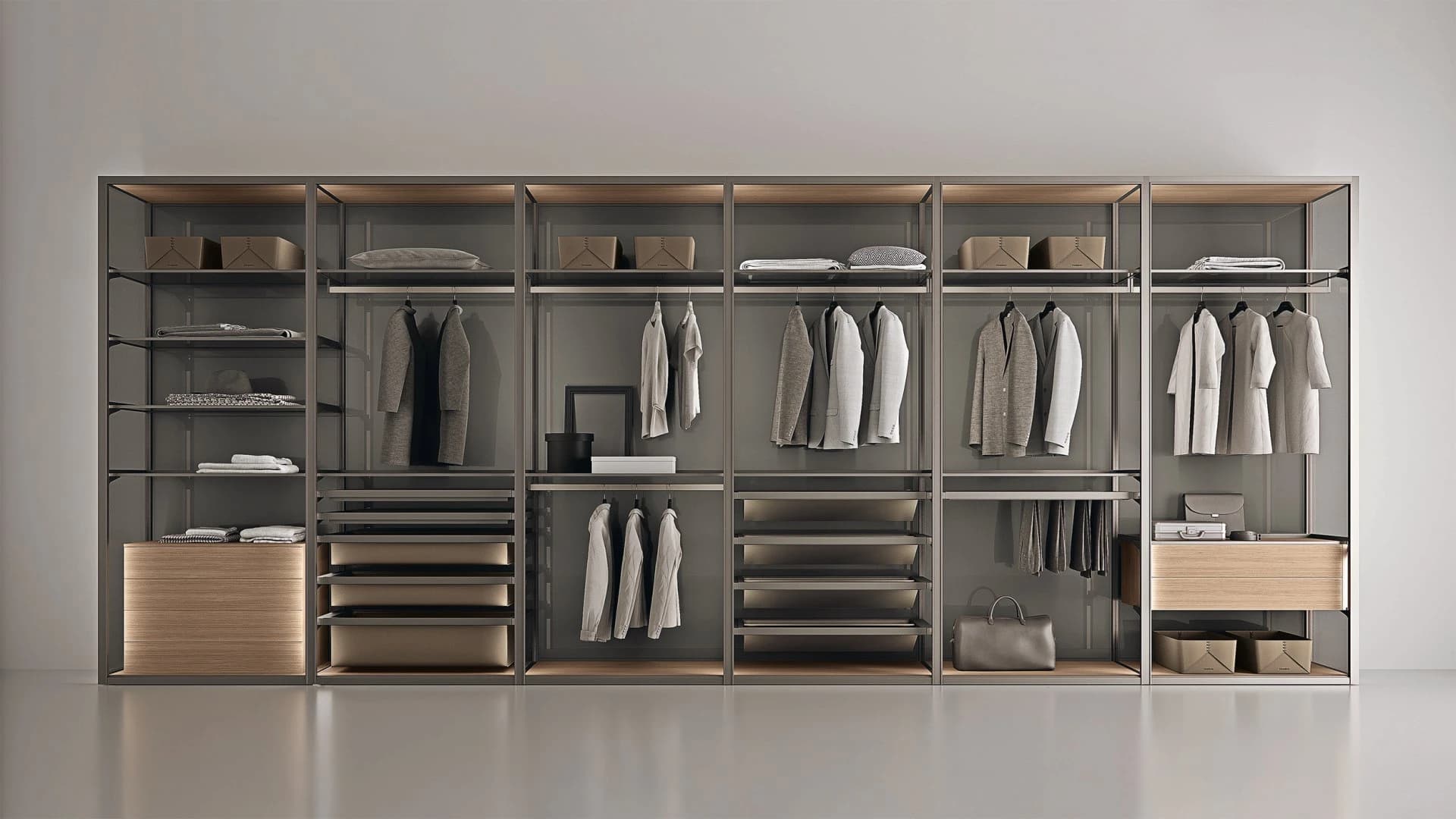 A six-bay open wardrobe system in bronze aluminium with light timber shelving